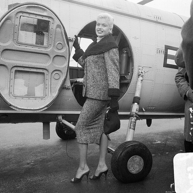 Jayne Mansfield entering a plane